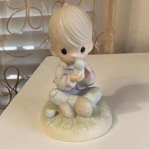 Vintage Precious Moments boy with bird figurine, 1981